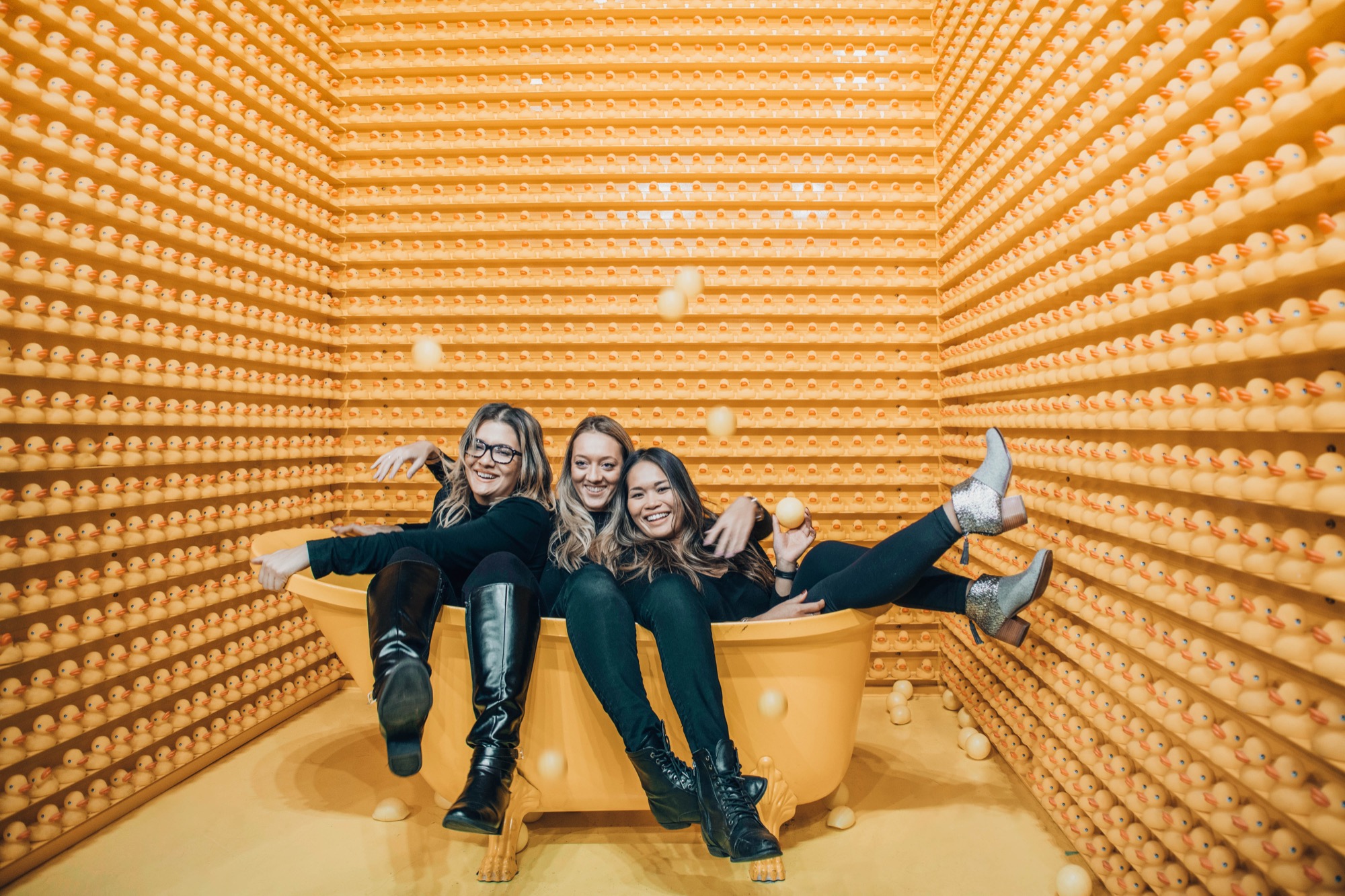 three women in a bathtub